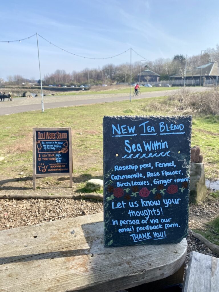 Chalkboard sign showing herbal tea blend at Soul Water Sauna Granton