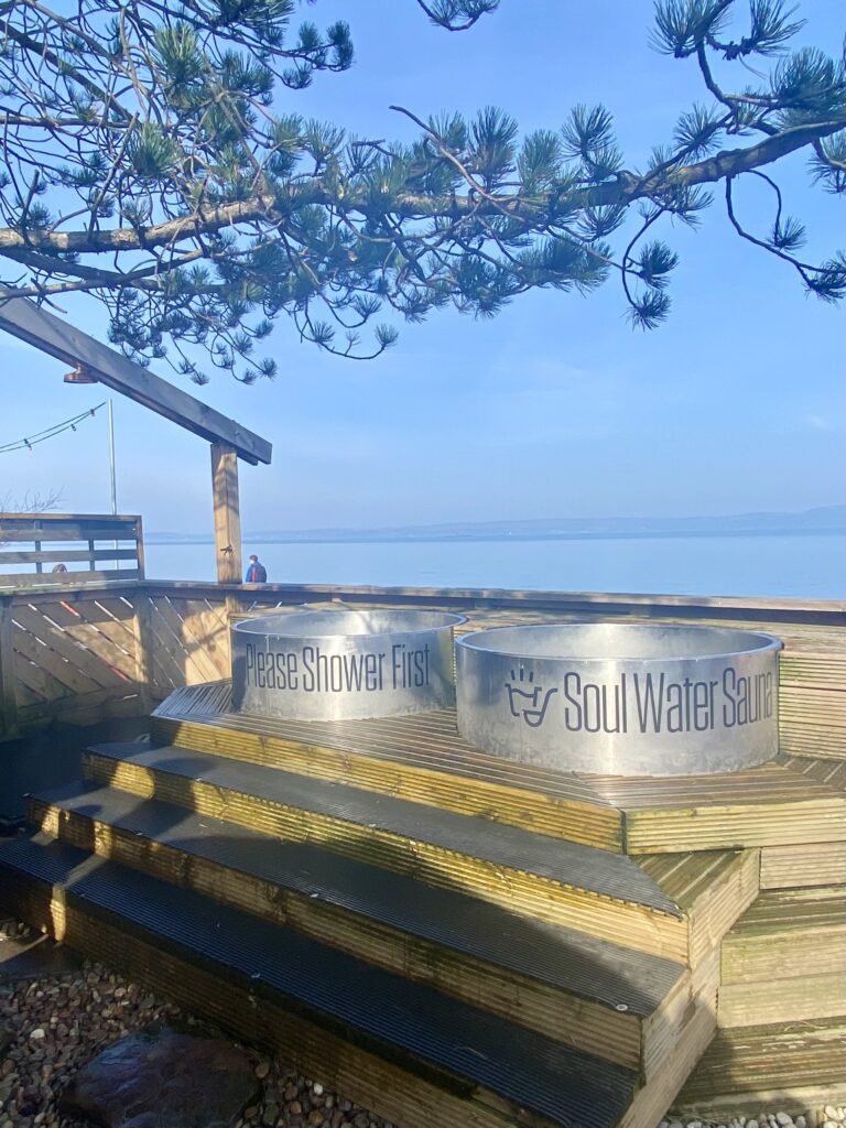 Cold plunge tubs at Soul Water Sauna Granton with close view of the water and decked area