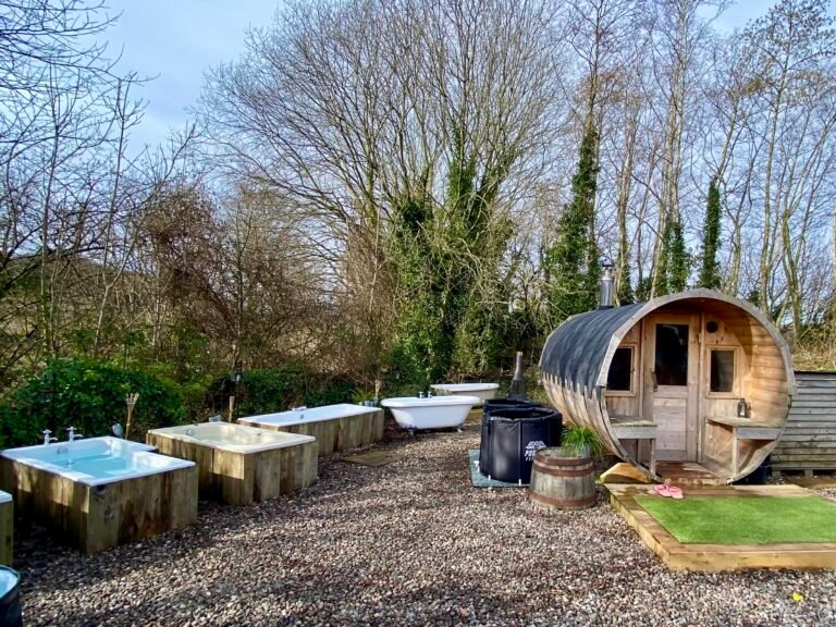 Outdoor sauna and ceramic cold plunge baths at Viking Heat Retreat in Fife