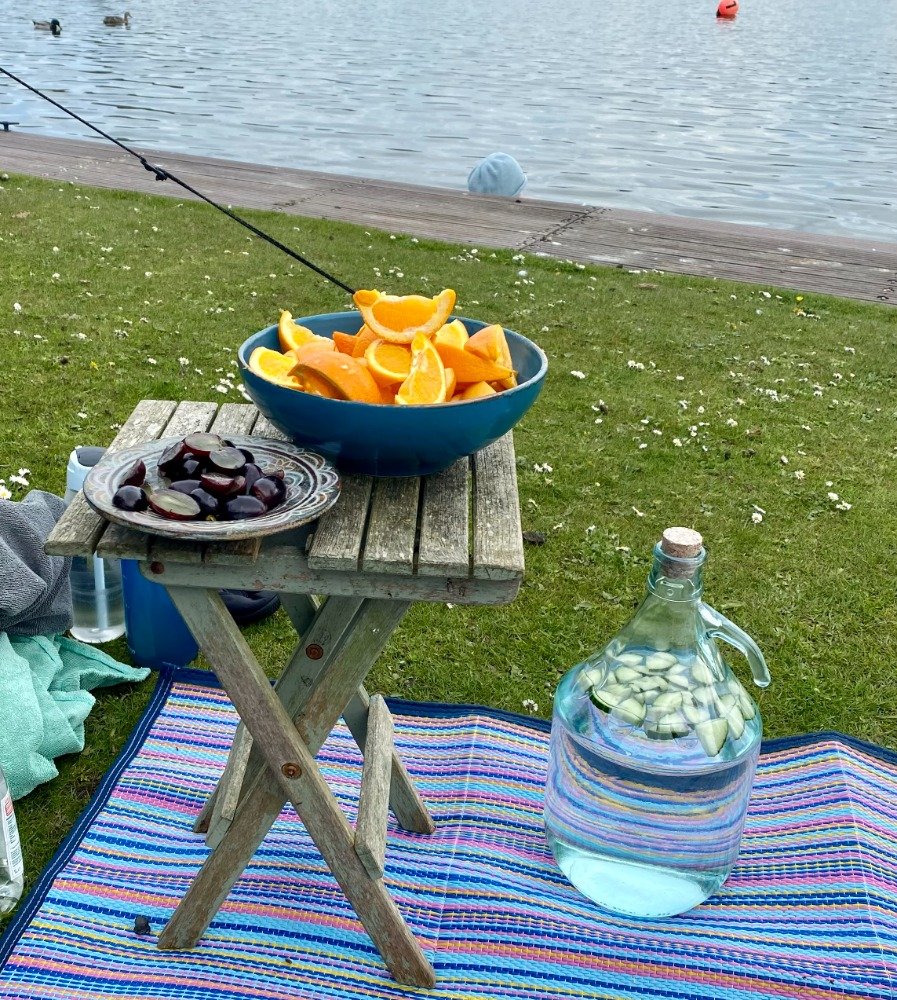 Fresh fruit laid out on a mat outside The People’s Sauna
