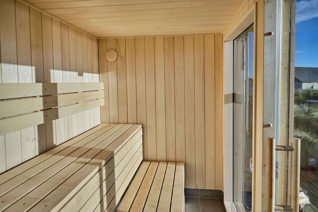 Interior of Elie Seaside Sauna with wooden benches and window