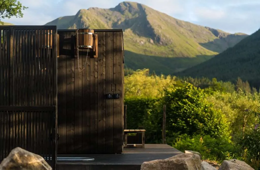 Outdoor sauna with mountain views in Glencoe Highlands