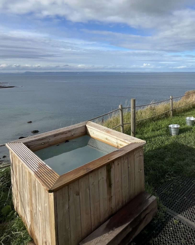 Cold plunge pool at Escape Sauna North Berwick overlooking the Firth of Forth