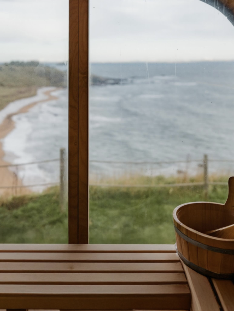 View from inside Escape Sauna North Berwick looking out over the Firth of Forth coastline