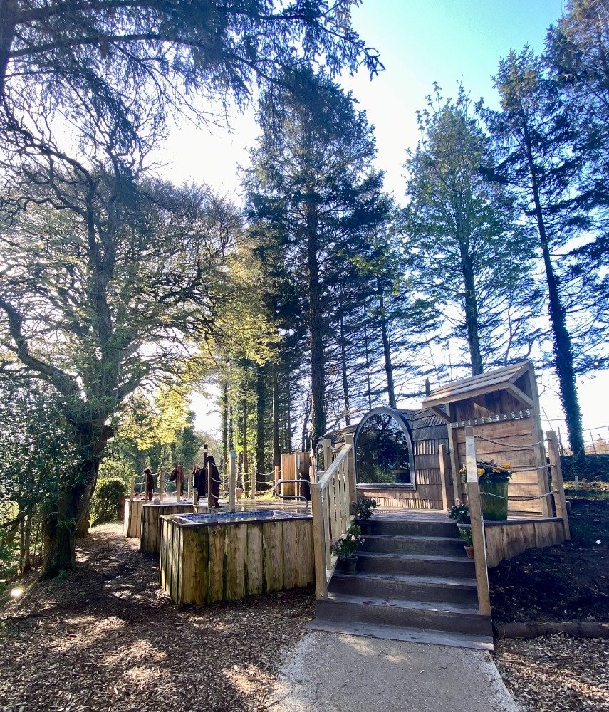 Outdoor saunas and jacuzzis tucked among the trees at Galgorm Resort thermal village