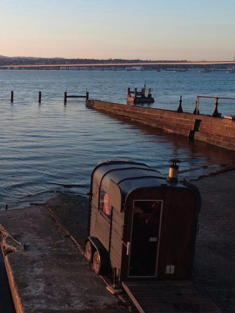 Horsebox Sauna Fife on the pier at Newport-on-Tay with views across the River Tay to Dundee