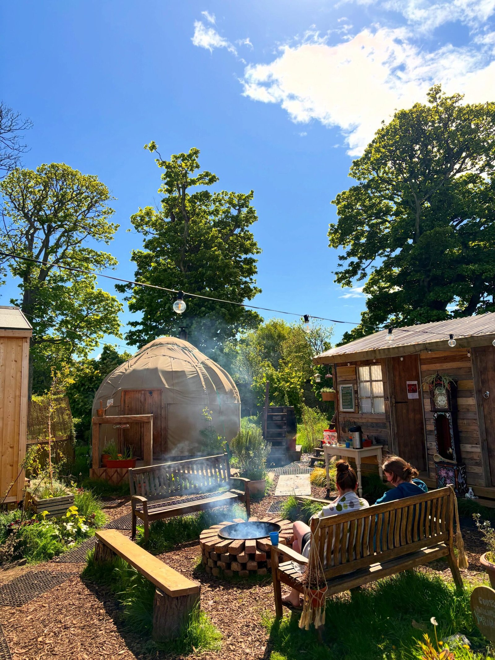 Hot and Bothy sauna village at Archerfield showing yurt sauna bothy and fire pit East Lothian