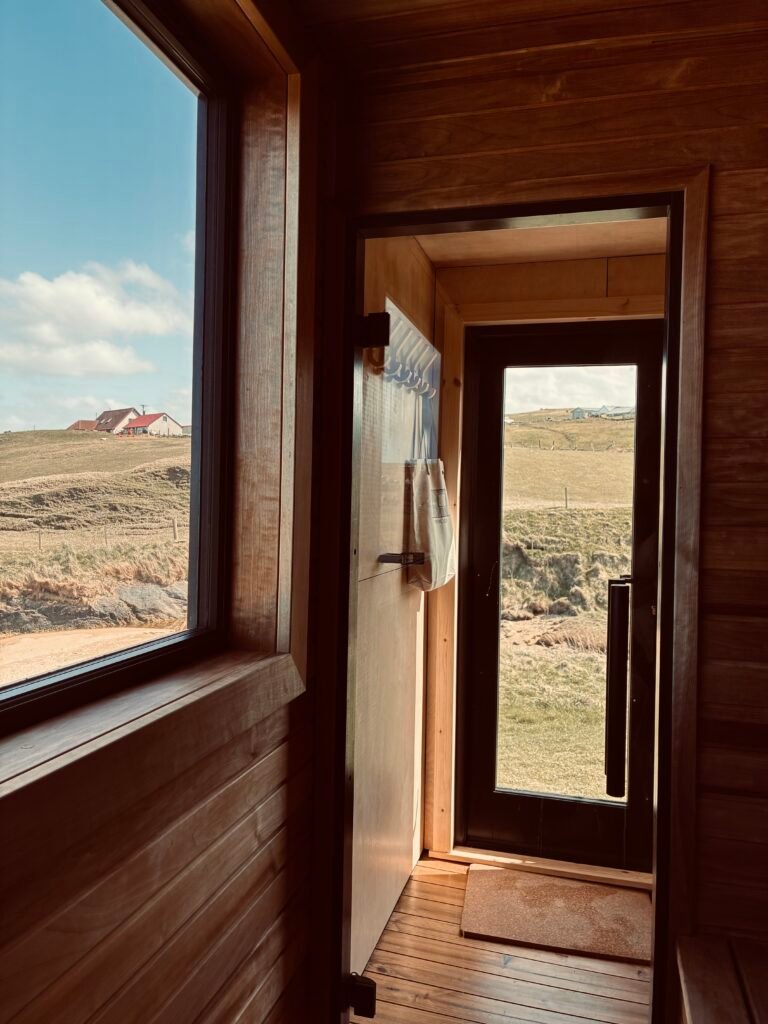 Inside Nordic Glow Hot Hoose sauna looking towards the changing vestibule at Ollaberry Bay Shetland
