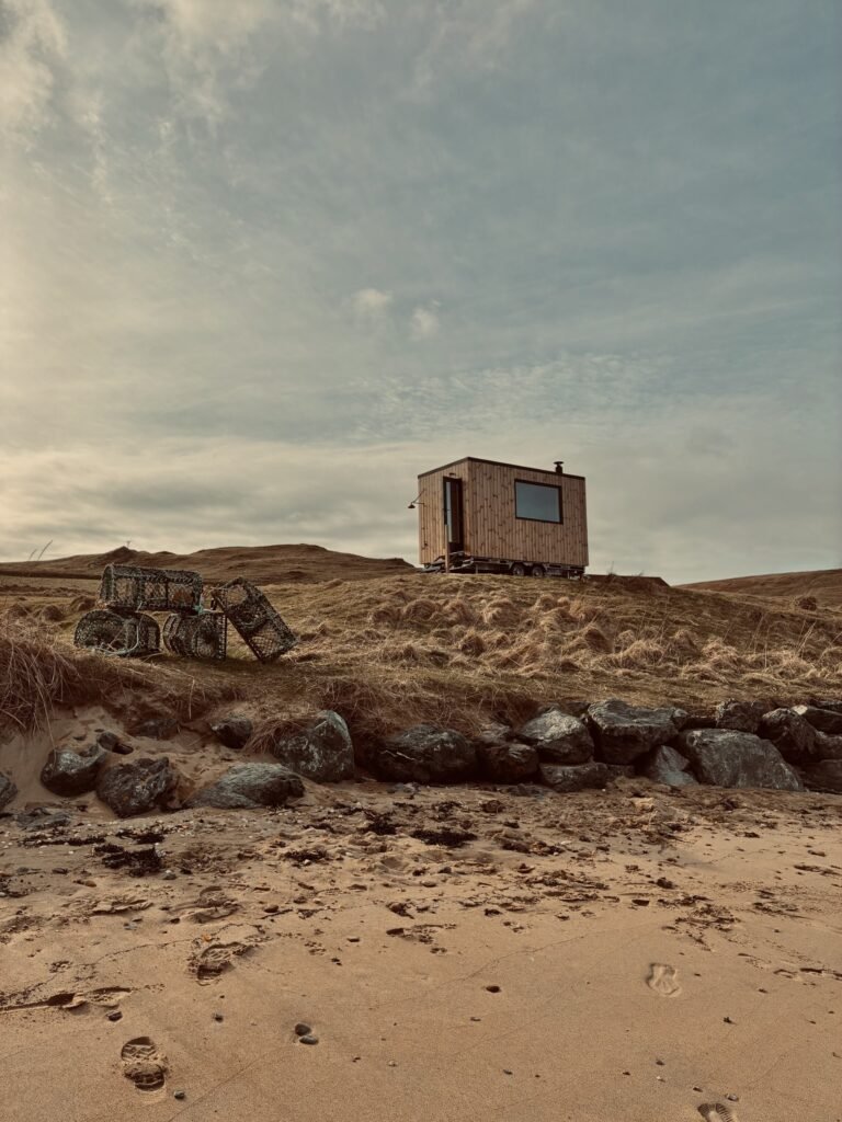 Nordic Glow Ollaberry Shetland Hot Hoose beach sauna on the shores of Ollaberry Bay in Shetland