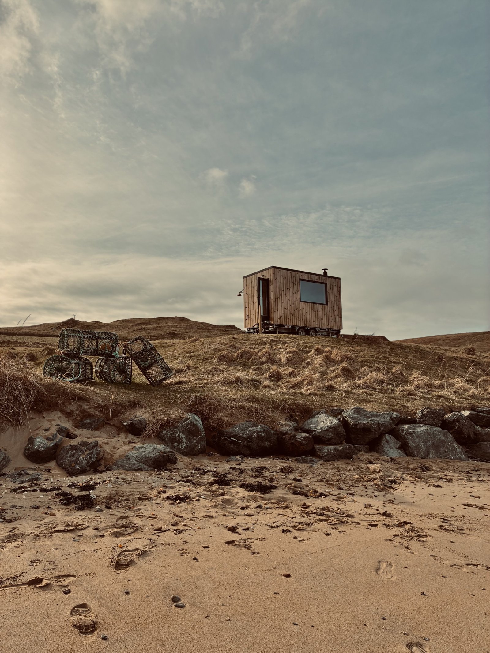 Nordic Glow Ollaberry Shetland Hot Hoose beach sauna on the shores of Ollaberry Bay in Shetland