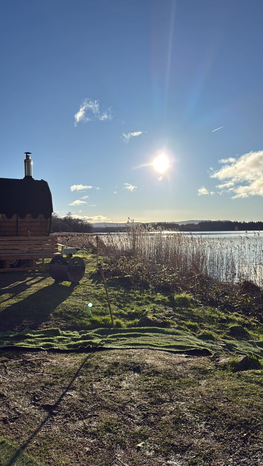 Wild Sauna Company Lake of Menteith sun shining over the Lake of Menteith