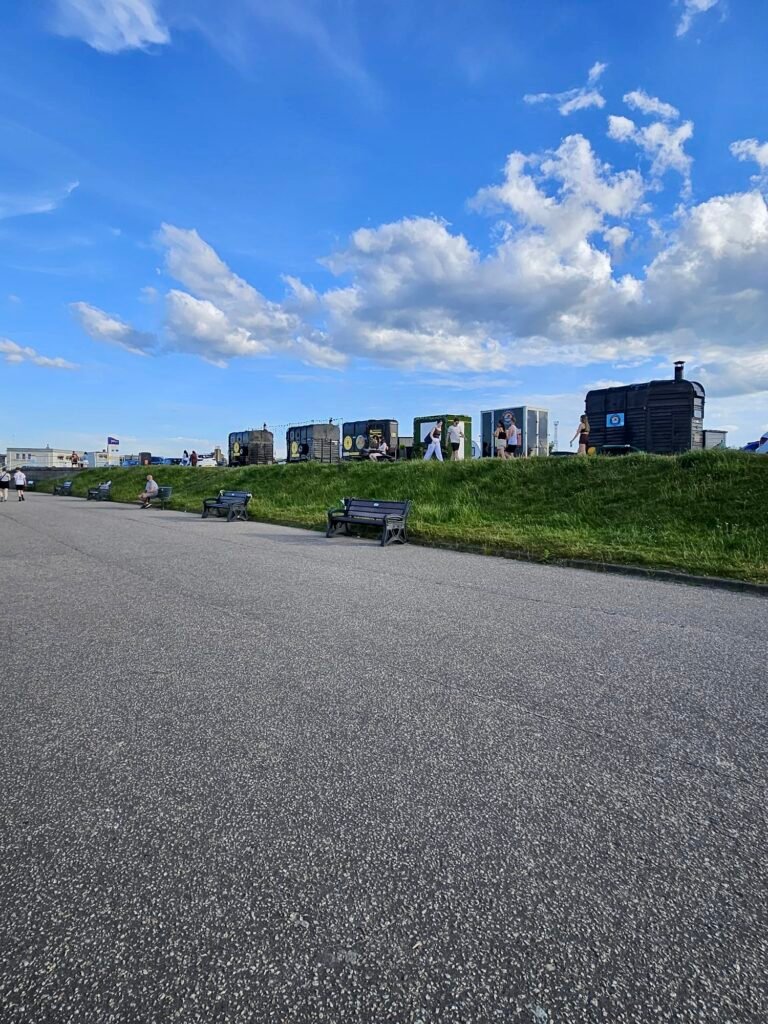 Barbossauna's horsebox saunas set along the grassy mound above Aberdeen's promenade