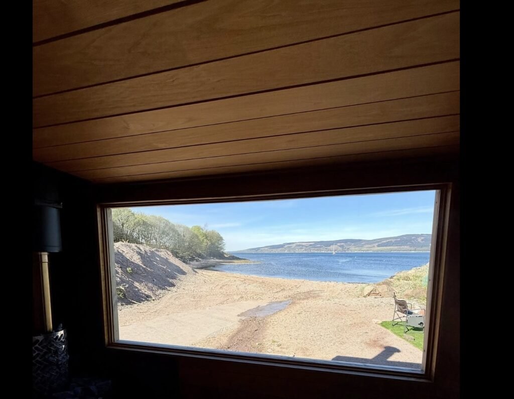Clyde Coast Saunas Kip Marina interior view through the window to the beach