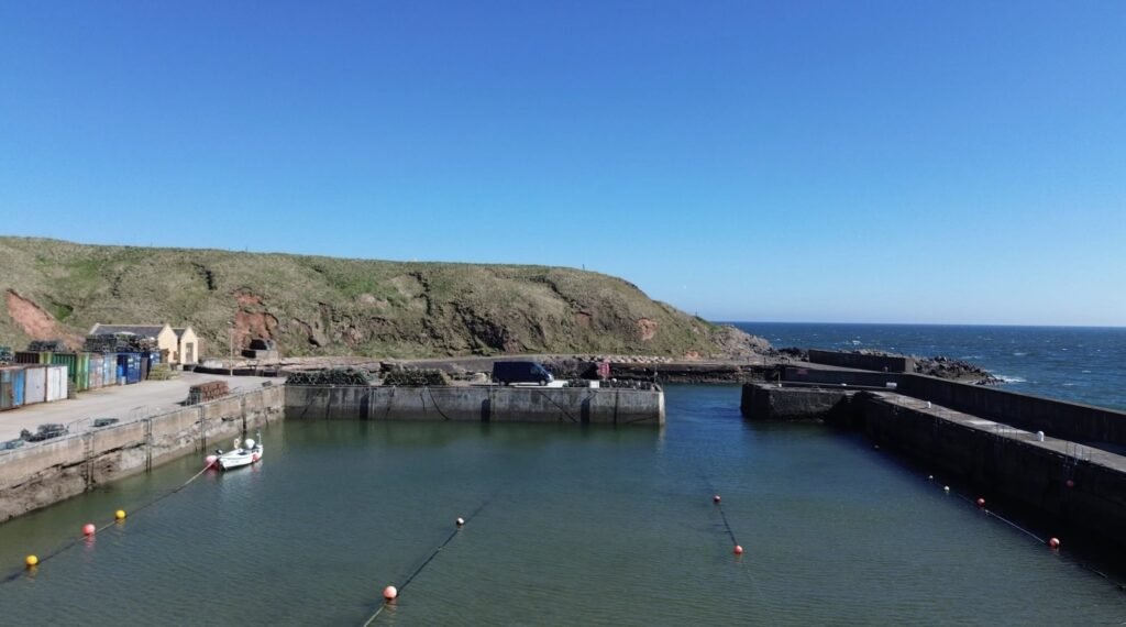 Fraileach Sauna Cruden Bay harbour setting, Cruden Bay's sheltered cove and cliffs
