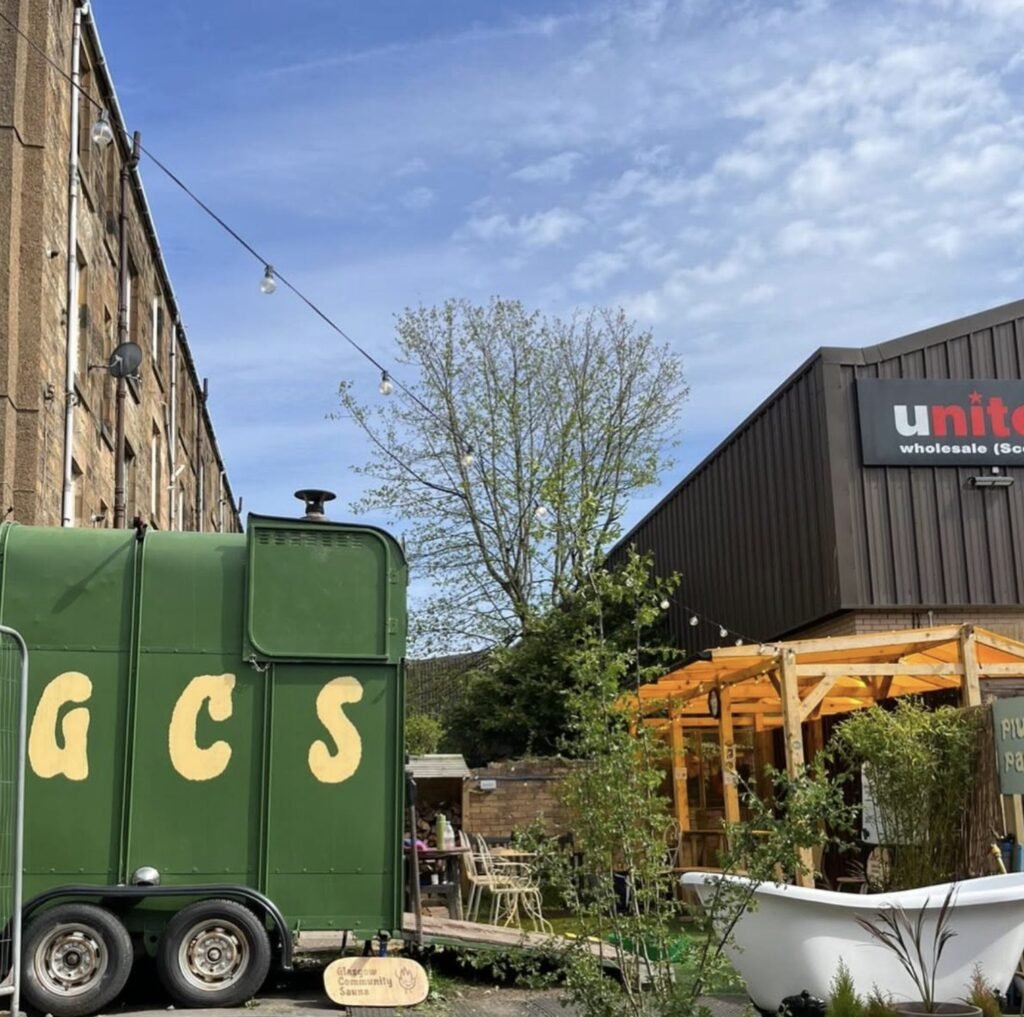 Glasgow Community Sauna Pollokshields horsebox sauna and courtyard seating area