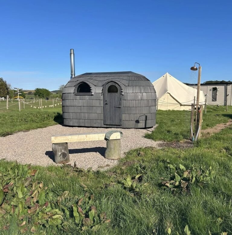 Maycroft Retreat Sauna Forgandenny exterior with its turf-style roof and arched windows