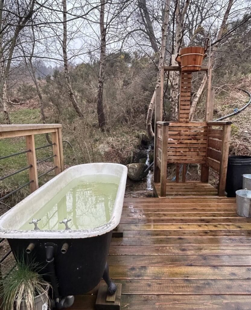 Nowhere Sauna Comrie Croft vintage cold plunge tub on the woodland deck