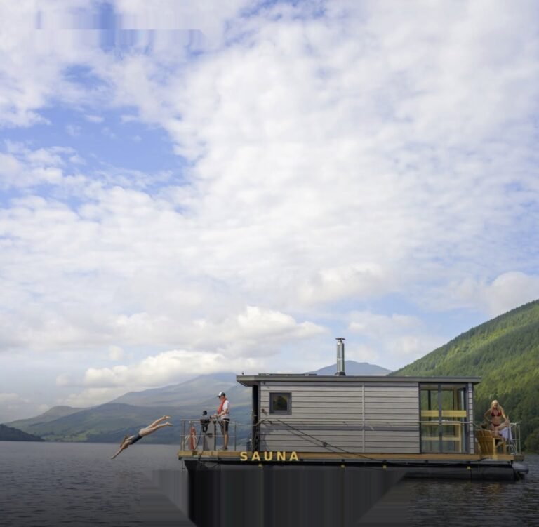 Taymouth Marina Hotbox Boat Sauna Kenmore floating on Loch Tay with a guest diving in