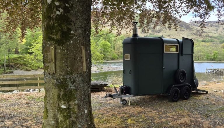 Thaw Sauna Strathearn exterior beside the loch with the Perthshire hills behind