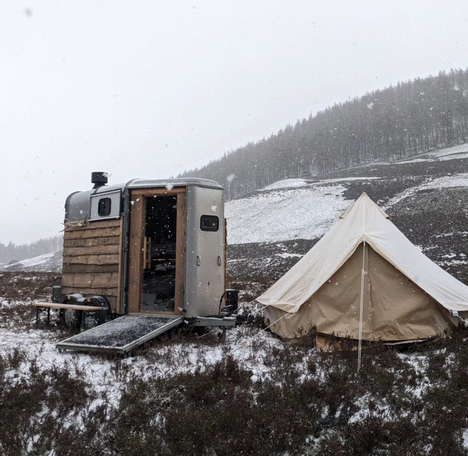 Wild Braemar Wilderness Sauna Cairngorms horsebox sauna and bell tent in snow on the moor