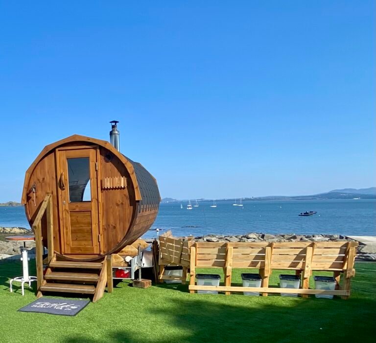 Wild Sauna Company Dalgety Bay Sailing Club close up of sauna and seating area overlooking Firth of Forth