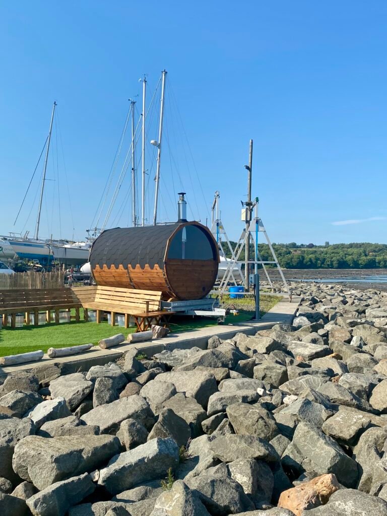 Wild Sauna Company Dalgety Bay Sailing Club sauna in front of boatyard