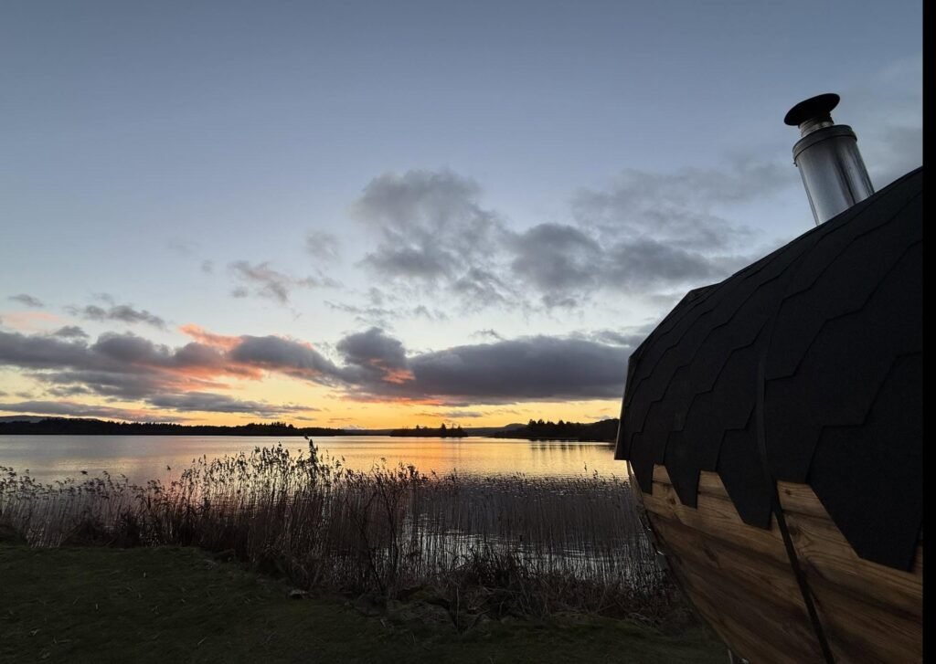 Wild Sauna Company Lake of Menteith exterior at golden hour by the loch