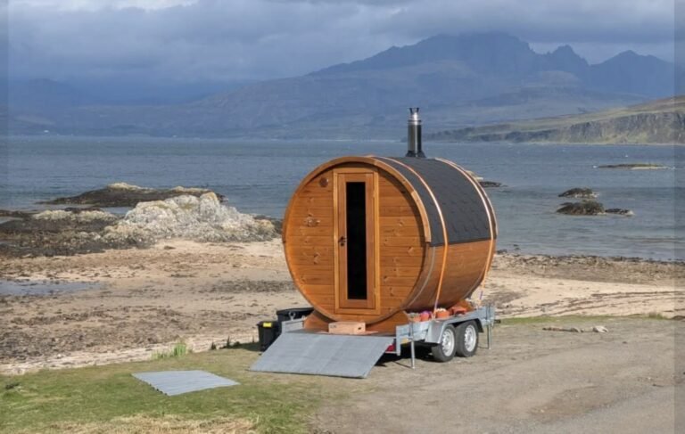 Sal Sauna Isle of Skye on the beach with the Cuillins under a moody sky