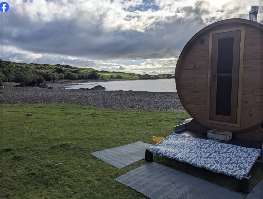 Sal Sauna Isle of Skye exterior with sea view and bench seating