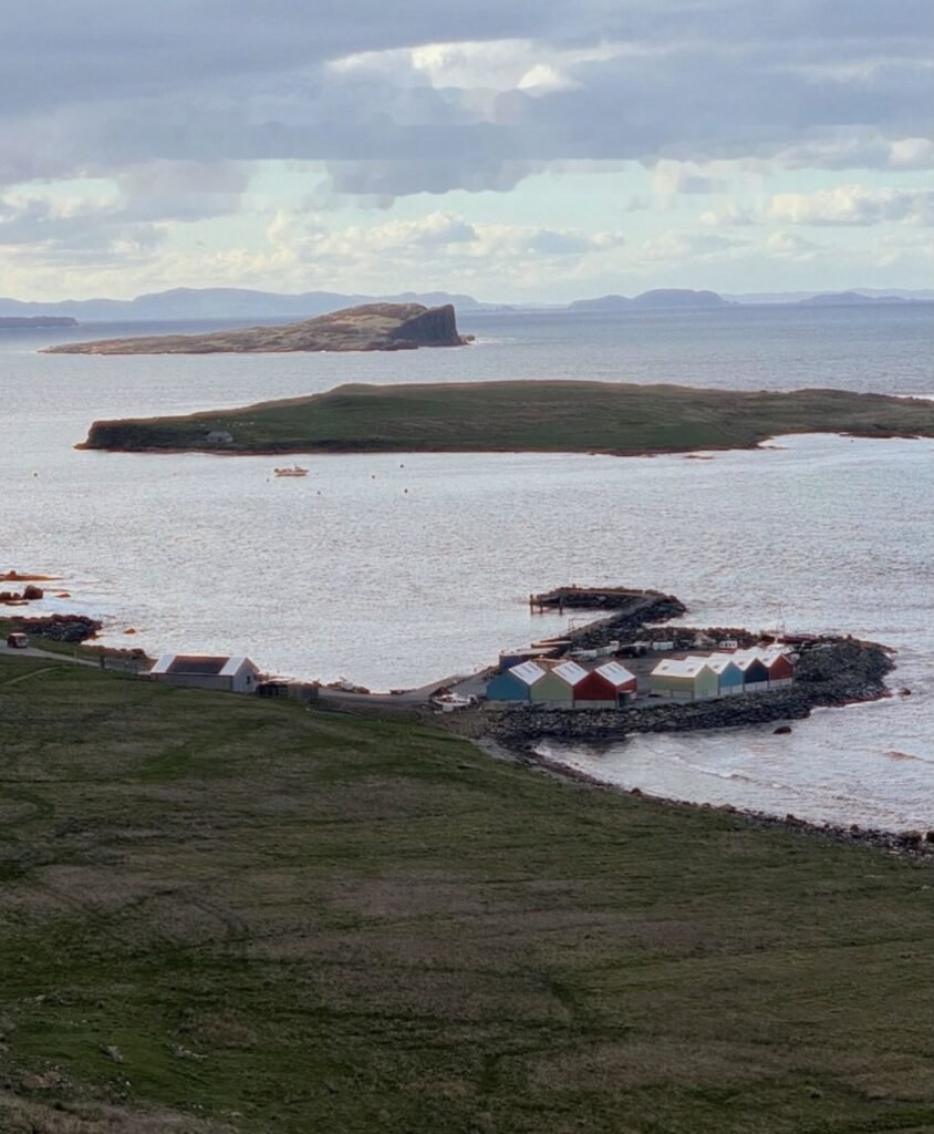 Coastal view of the Staffin islands and boat sheds near Staffin Sea Sauna Isle of Skye