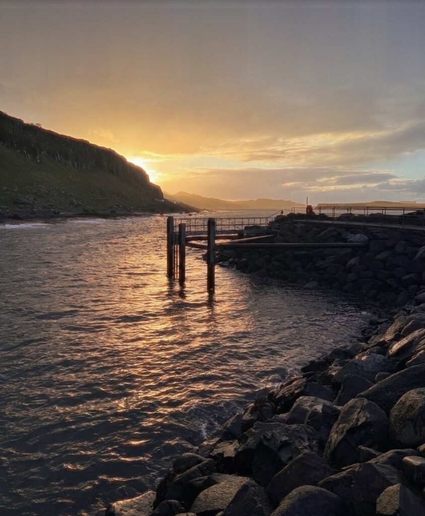 Sunset over the pier near Staffin Sea Sauna Isle of Skye